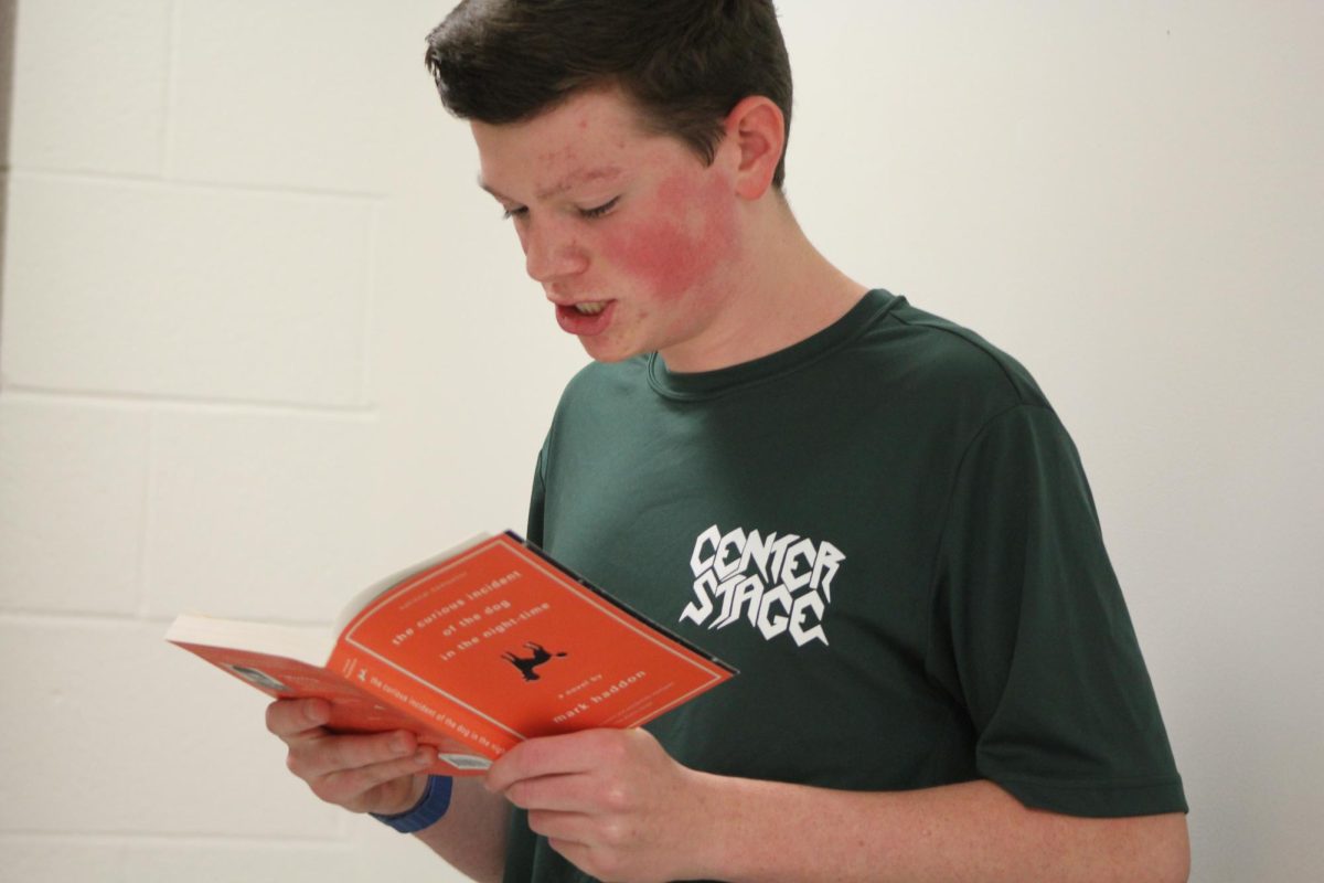 Cooper Buckallew, sophomore, reads from the "The Curious Incident of the Dog in the Night-Time" by Mark Haddon to prepare for his lead role: Christopher Boone in the MTC fall adaptation with the same name.