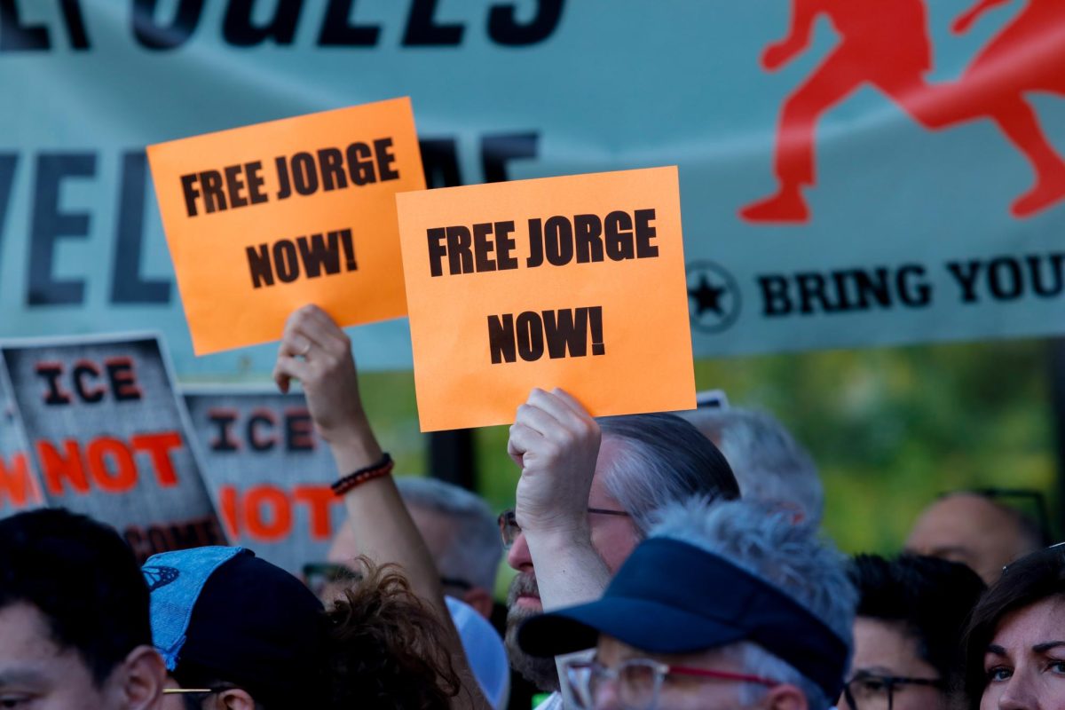 Protesters held signs with messages such as “free Jorge now!” and “ICE is not welcome here” at the rally Sept. 26.
