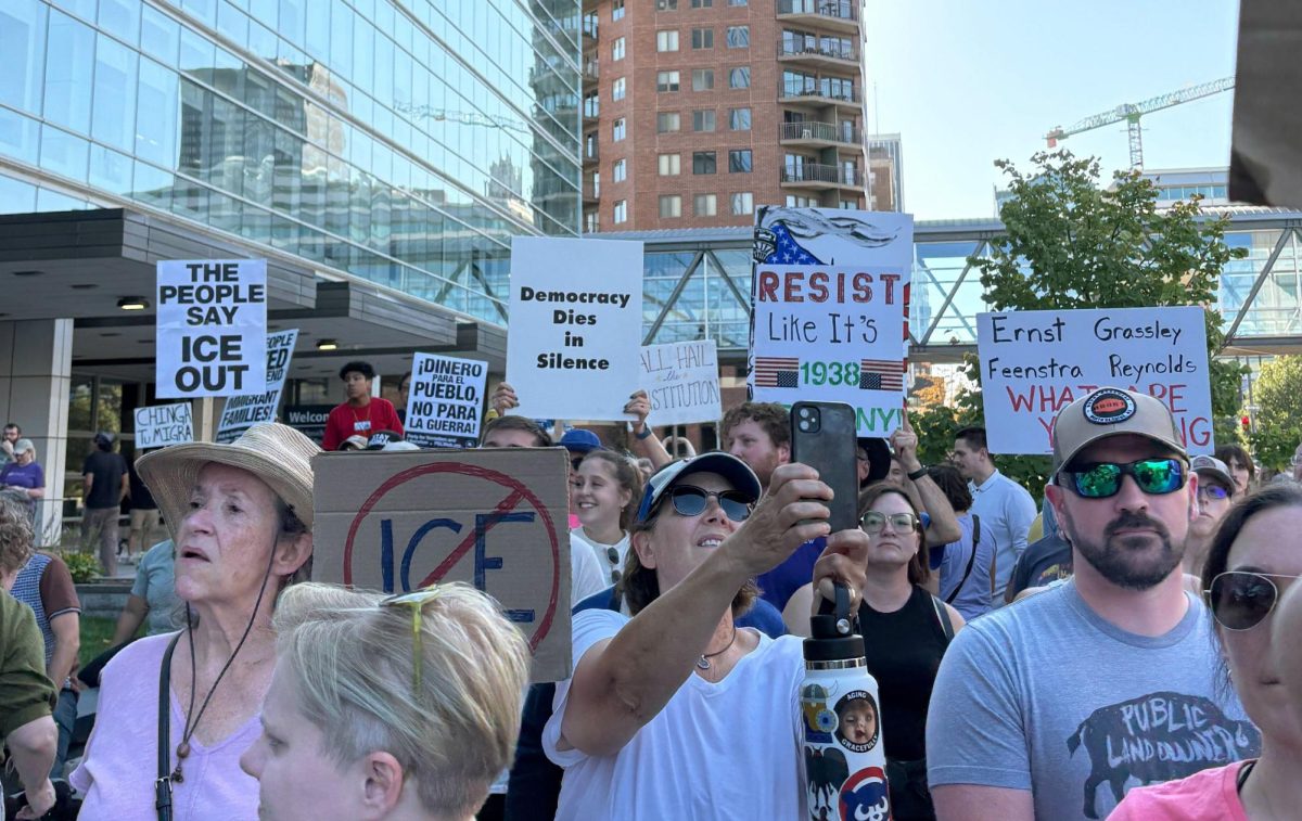  Community members gathered Downtown in front of the Neal Smith Federal Building to protest Roberts’ arrest and ICE’s presence in Iowa. 