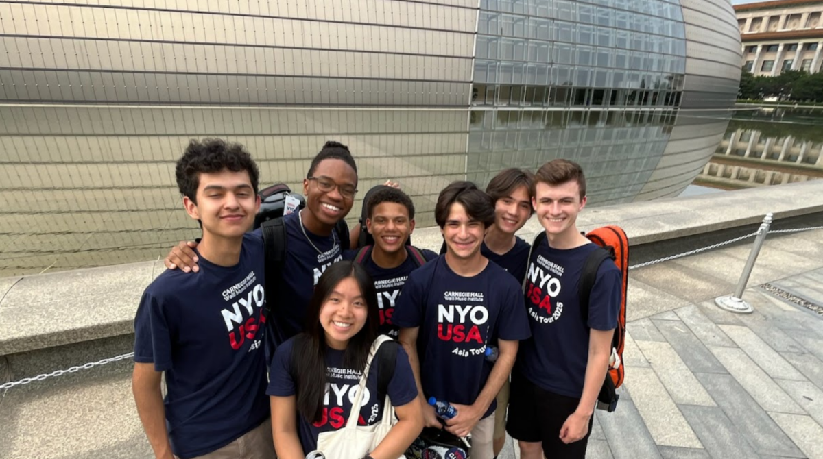 Katherine Nguyen and her NYO friends stand in front of the Beijing Performing Arts Center. “My favorite part of the tour was probably the second half of the tour, like Shanghai and Seoul, just because I got close to the people I was with,” Nguyen said.