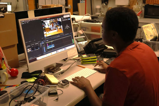 Senior Jahmari Abbott works on an assignment for the TV Production class. Without students livestreaming, the focus of the class has shifted. 