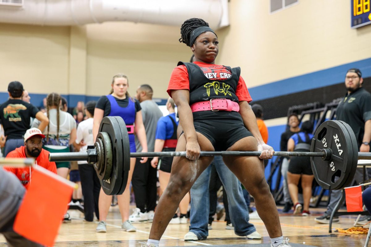 Zia'Yiah Bookman deadlifts at 315 pounds at the New Caney High School invintational meet Jan. 17. Bookman totaled 750 pounds in the 181.5-pound weight class.