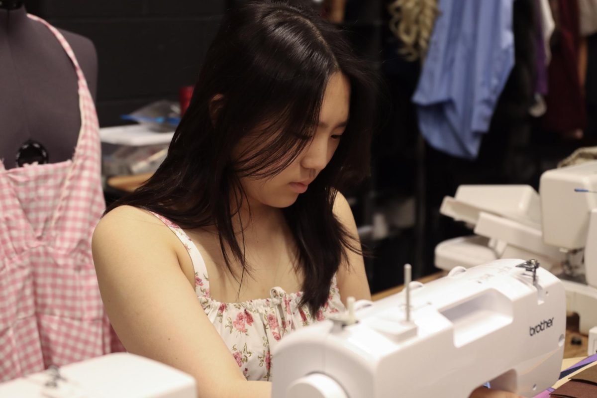 Sophomore Payton Cha sews in room Drama A during fourth period theater. After a spark of interest in fifth grade, she taught herself how to sew and design in sixth grade.
