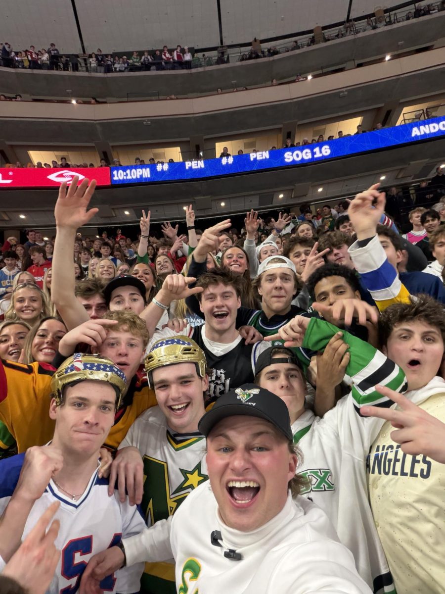 By the end of the tournament, Kalinowski was fully immersed in Edina’s hockey culture. Courtesy of Tim Kalinowski.