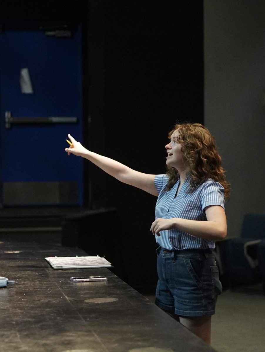 Senior Maggie Brown rehearses with cast of "Walk You Back To Your Car" in the FABT on April 9. 