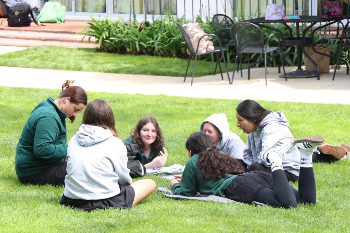 Students sit in the main courtyard, engaged in conversation and completing homework. According to New York University, many students find it challenging to balance the pressure to be productive with their daily lives. This often leads to overscheduling with activities, extracurriculars and clubs. Oakwood freshman Mika Testa said this constant busyness has impacted her negatively. "My motivation has definitely got worse, because I'm definitely more tired than I usually am," Testa said. "Especially this year, with the workload increasing, I'm definitely less motivated than I was last year."