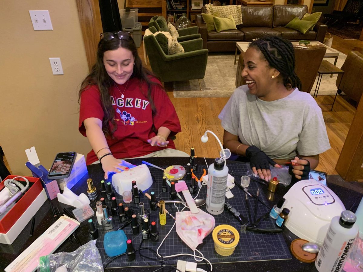 Seniors Maritza Tomlinson and Aynalem Rehling do their own nails  together. Both used Pinterest for finding design inspiration for themselves. 