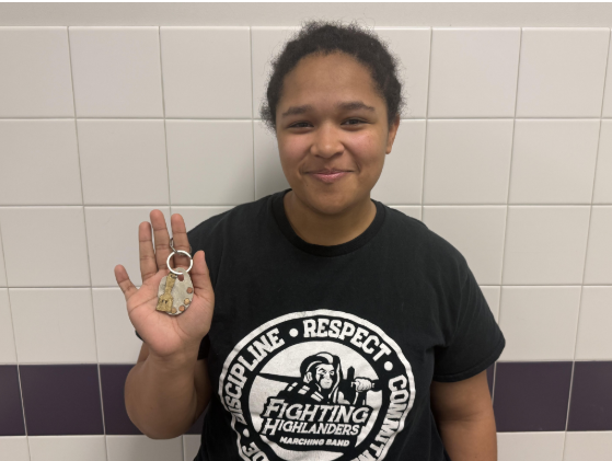 Junior Amx Marshall displays the keepsake he received from the Metal Mulisha club.